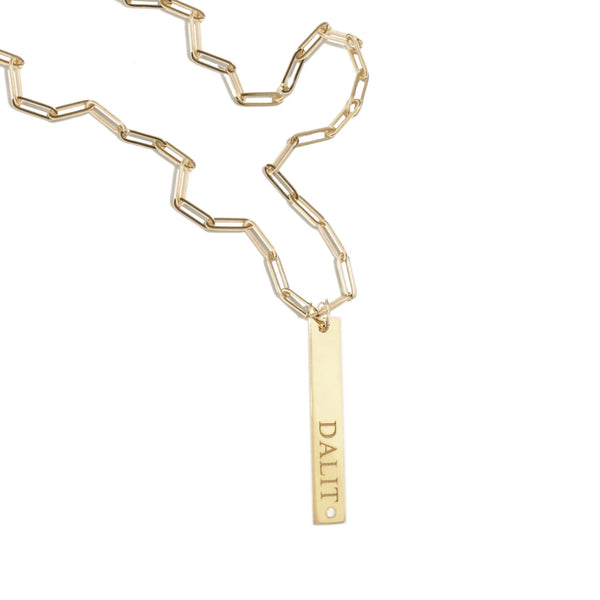 gold bar necklace on paperclip chain